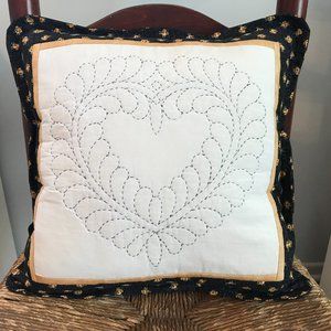 Handmade and hand quilted square heart pillow